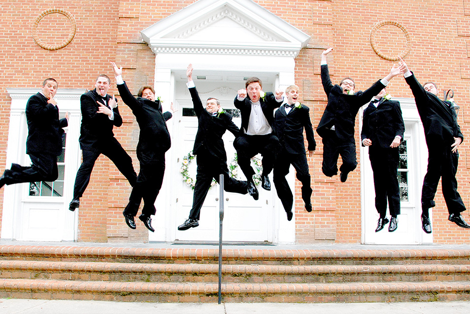 Nikon Moving Moments Photo Contest award winning photo of groomsmen jumping at a wedding