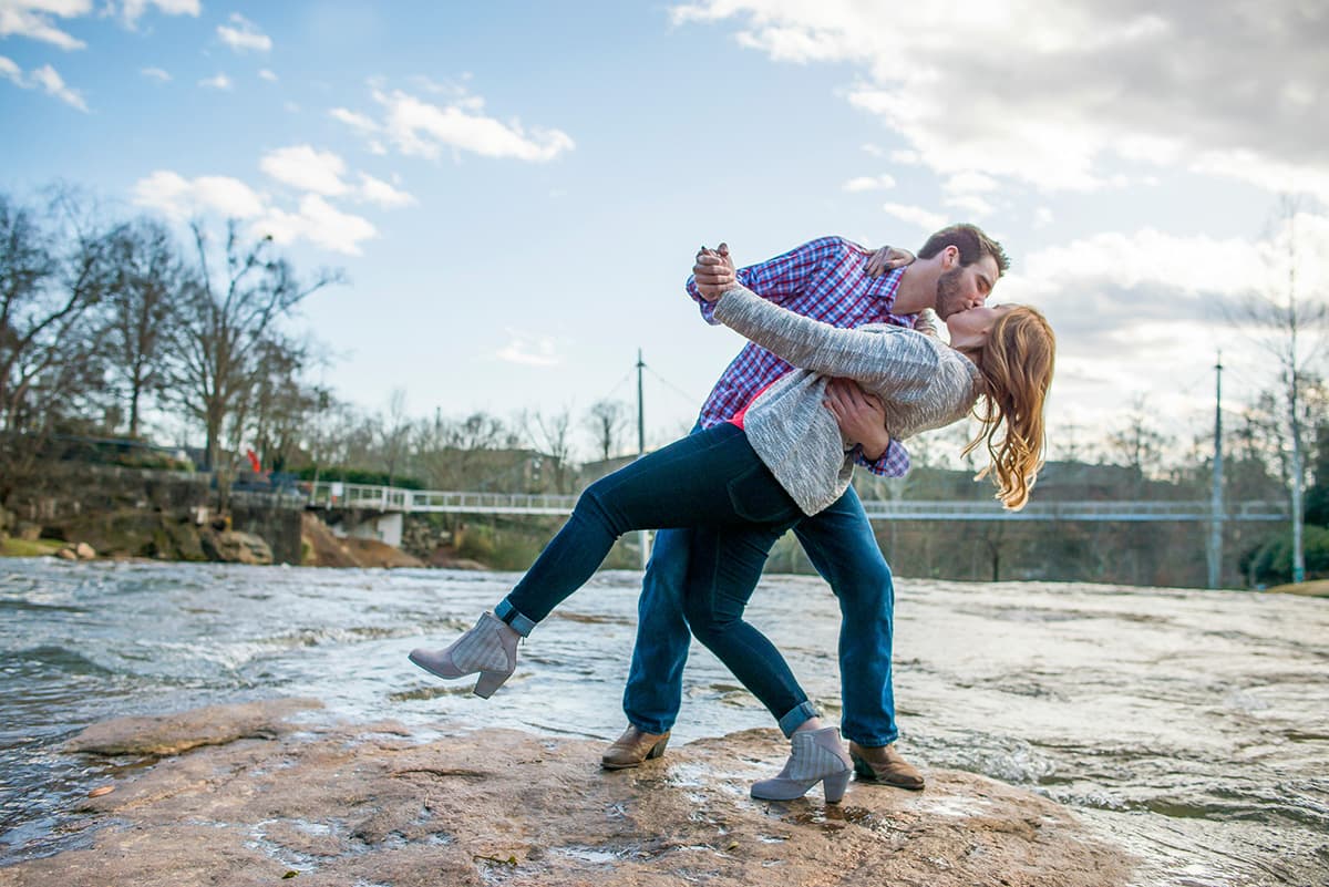 Engagement pictures on a river in downtown Greenville, SC