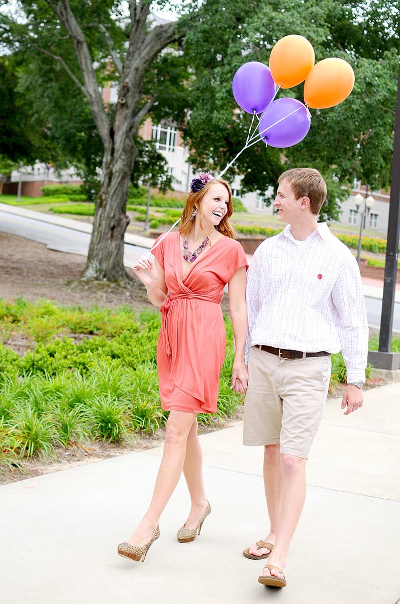 Engagement pictures at Clemson University with orange and purple balloons
